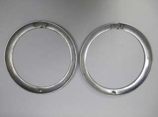 This is a pair of rare 1941 42 headlight bucket trim rings for Dodge 