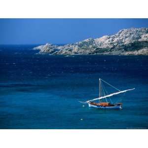 com Traditional Sailboat on Rocky Coast of Island, Sassari, Maddalena 