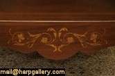 pair of 1900 era twin size sleigh beds are mahogany with subtle 