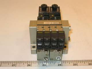   our online store is an SMC Pneumatic 4 Solenoid Valve Bank Assembly