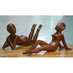  Wood sculptures, Sunbathers (pair): Home & Kitchen