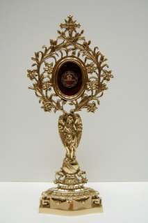 You are bidding on this ornate angel reliquary only (the relic is 