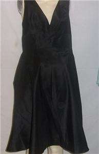   HALTER DRESS WITH LIGHT CATCHING SEQUINS & WAIST RUSHING.  SIZE 14