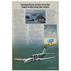  1975 Beechcraft Baron 58 Airplane Fly Over Water Print Ad 