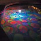   underwater disco party pool night lights show 