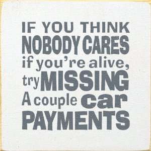   , try missing a couple of car payments. Wooden Sign