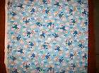 AN ADORABLE SMURFS TOSSED COTTON FABRIC BY THE YARD