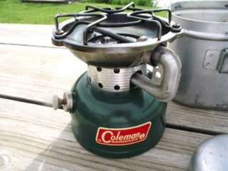 1966 Coleman 502 single Burner Stove in Canister with Handle dated 1 