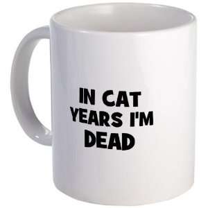 In cat years Im dead Humor Mug by   Kitchen 