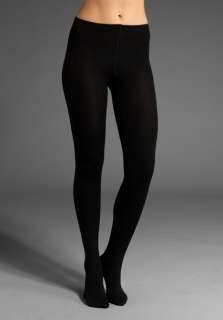PLUSH Full Foot Fleece Lined Tights in Black at Revolve Clothing 