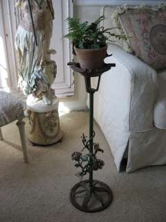 THIS IS AN AWESOME OF ASHTRAY STAND WITH AN INCREDIBLE TOLE ROSES BASE 