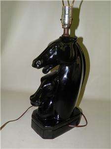   horse head in black glazed pottery. Good condition, please view photos