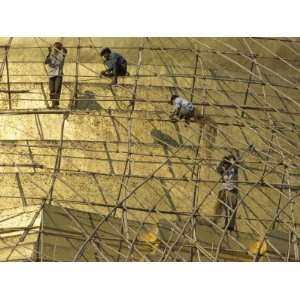  Workers on Bamboo Scaffolding Applying Fresh Gold Leaf to 